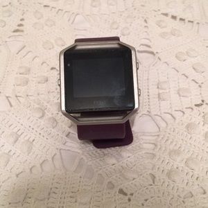 Fit bit blaze watch, purple band, and charger